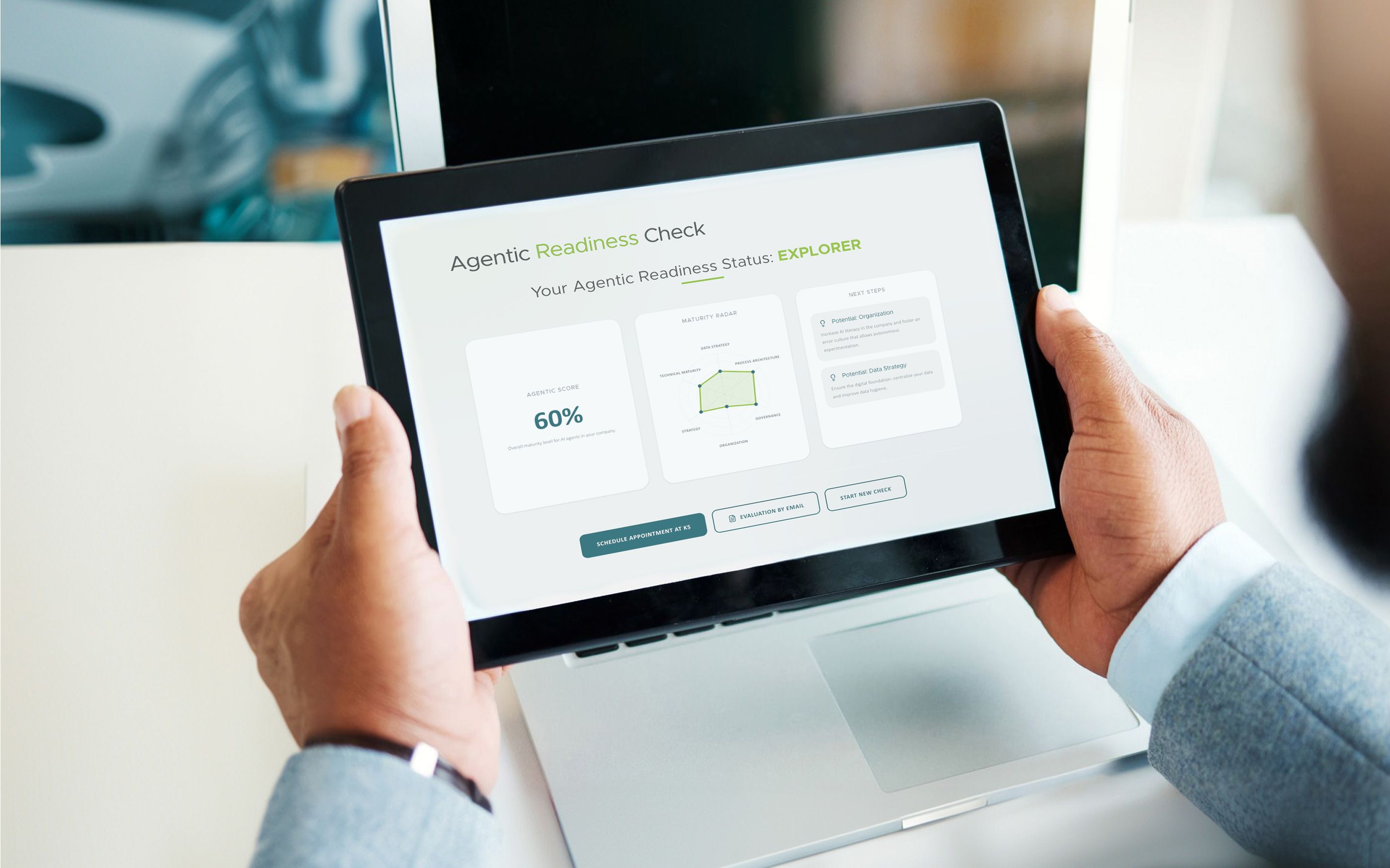 A person is holding a tablet displaying the “Agentic Readiness Status: Explorer” dashboard. The screen shows a score of 56%, a radar chart covering strategy, governance, and organization, as well as recommended next steps and action buttons at the bottom.